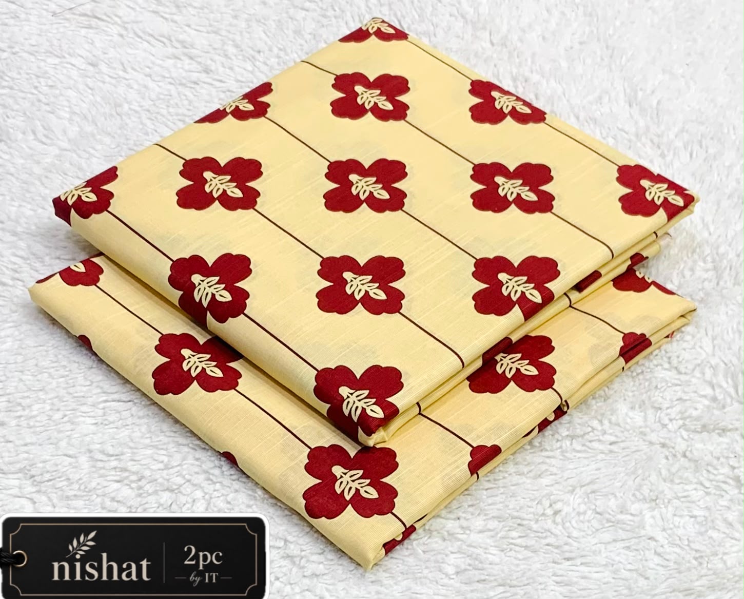 NISHAT ALLOVER KHADDAR 2PC BY IT - CREAM RED